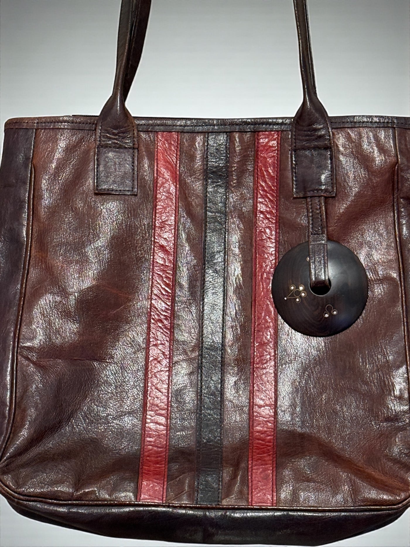 Red Ember Leather Tote – Handmade in Mali with Ebony Wood Accent