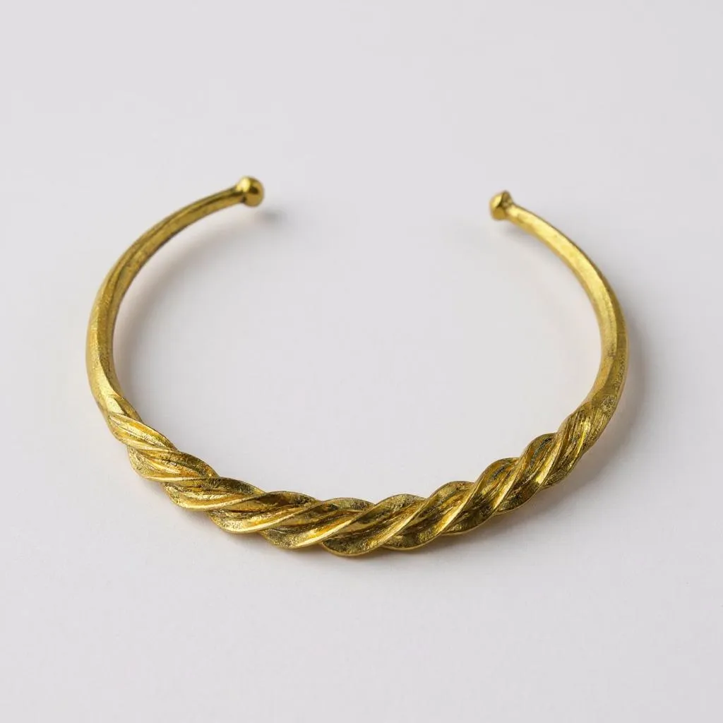 Twisted Fulani Brass Bracelet – Handmade African Cuff