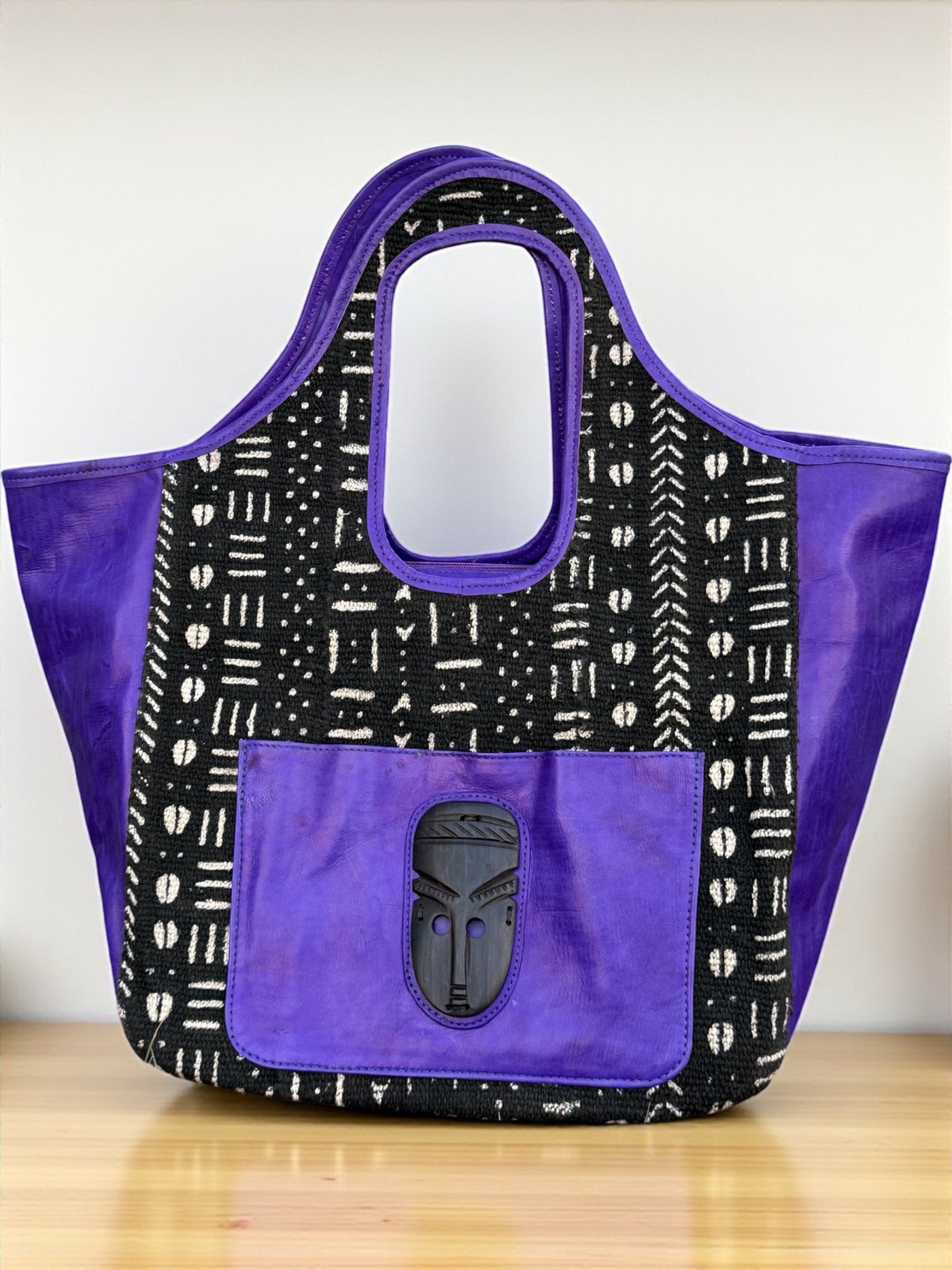 Royal Nomad Mudcloth Tote – Handmade in Mali with Purple Leather & Ebony Mask Accent (12x20x6)