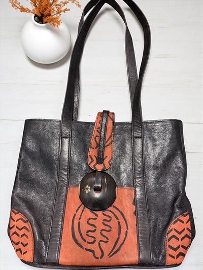 Ebony Harmony Leather Tote – Handcrafted in Mali with Adinkra Symbol Detail