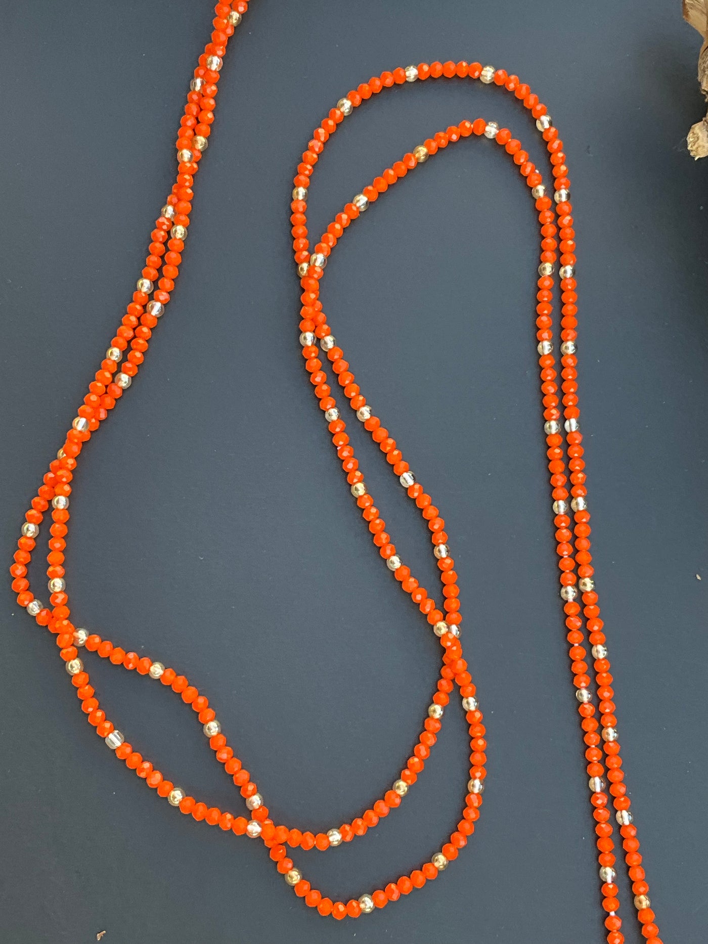 Adjoa’s Glimmer: Traditional Orange Waistbeads 45 Inches