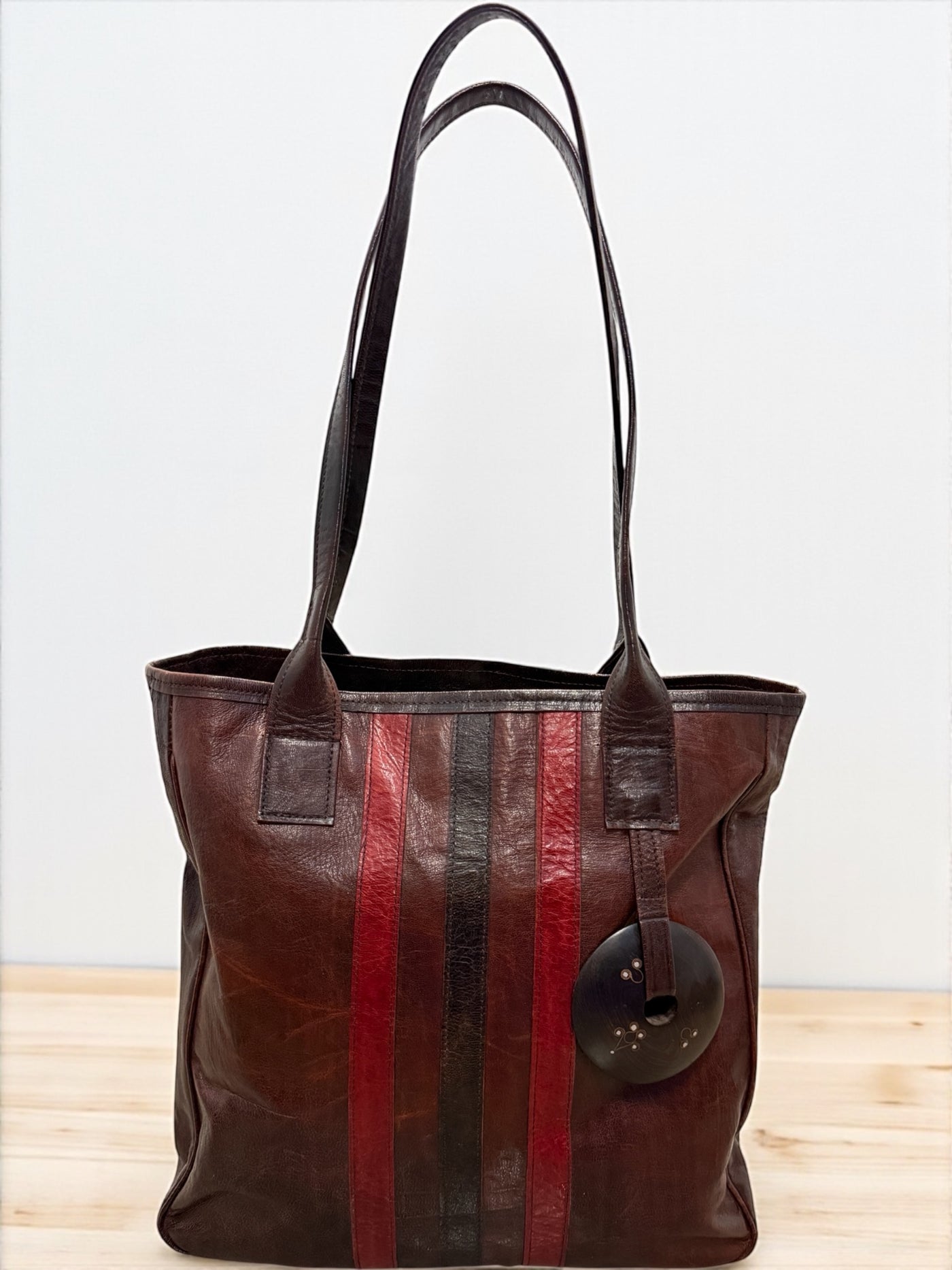 Red Ember Leather Tote – Handmade in Mali with Ebony Wood Accent