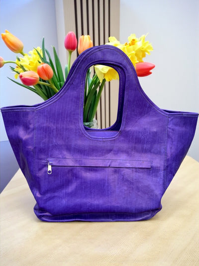 Royal Nomad Mudcloth Tote – Handmade in Mali with Purple Leather & Ebony Mask Accent (12x20x6)