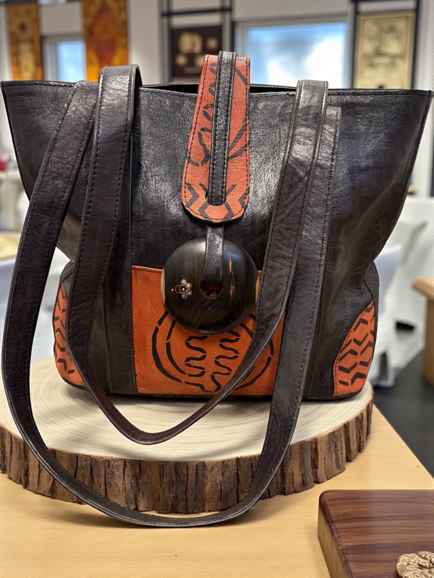 Ebony Harmony Leather Tote – Handcrafted in Mali with Adinkra Symbol Detail