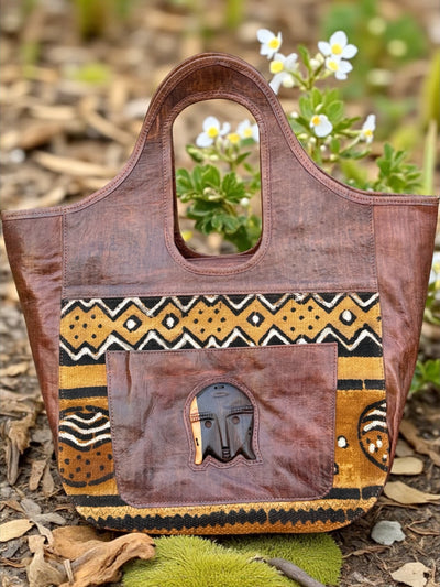 Savanna Spirit Mudcloth Tote – Handmade in Mali with Brown Leather & Ebony Mask Accent (12x20x6)