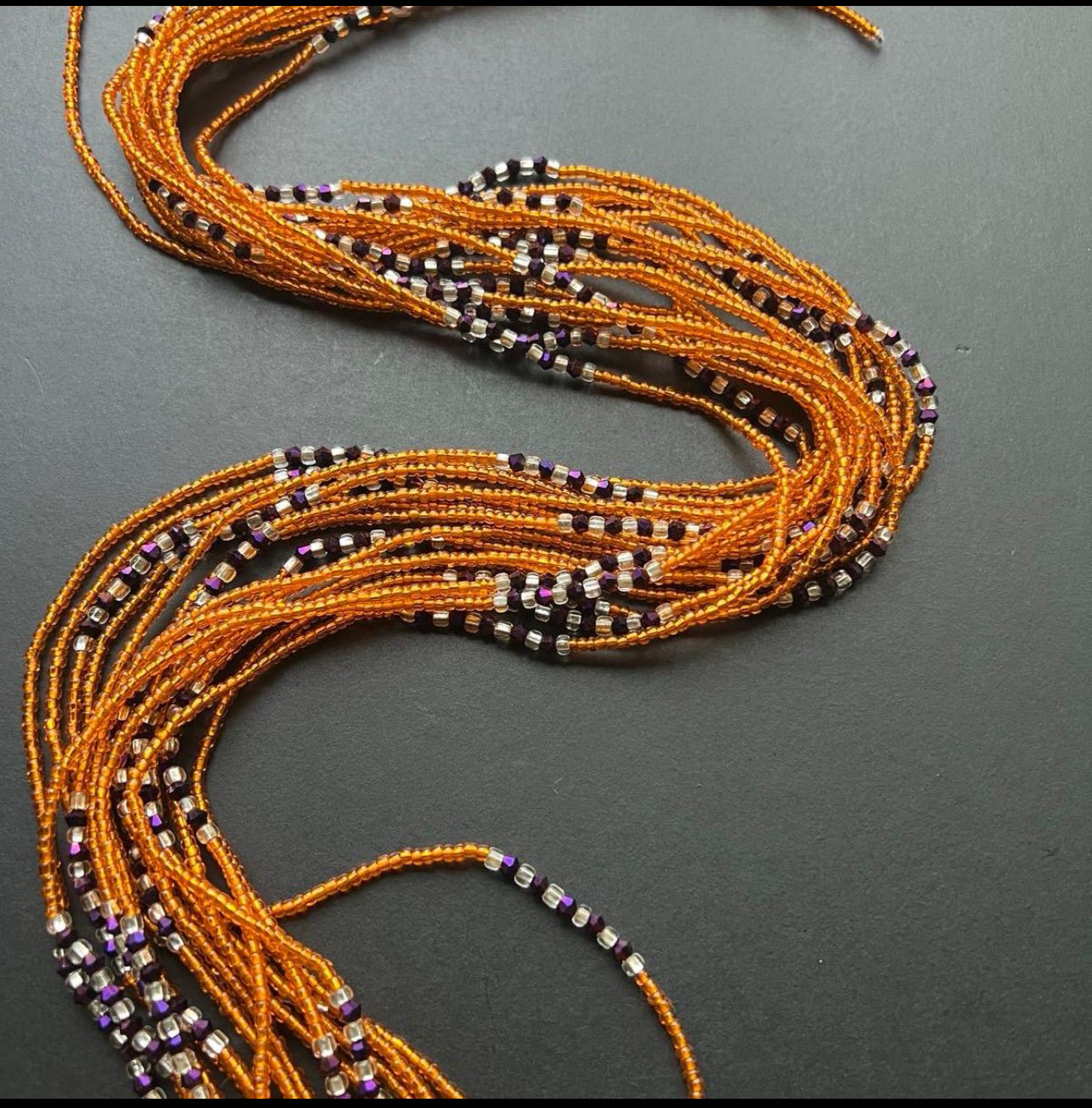 Ghanaian Heritage Unveiled. Single Strand Orange Waist Beads Collection 43 Inches