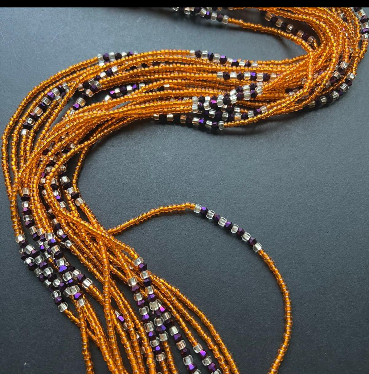 Ghanaian Heritage Unveiled. Single Strand Orange Waist Beads Collection 43 Inches (Wholesale)