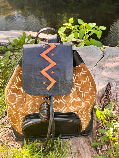"Artisanal Midsize Leather Backpack with Malian Bogolanfini Fabric Accent"