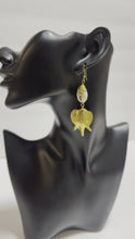Load and play video in Gallery viewer, Elephant Oasis - Brass and Cowrie Shell Earrings with Kenyan Charm
